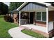 Close-up of a welcoming front porch with a 'Welcome' sign and cozy decorations at 232 Harmony Hills Dr, Catawba, SC 29704