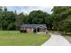 Charming single-story home with a well-maintained lawn, long driveway, and basketball court at 232 Harmony Hills Dr, Catawba, SC 29704