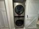 Efficient laundry area featuring a stacked LG washer and dryer for space-saving convenience and modern living at 232 Harmony Hills Dr, Catawba, SC 29704