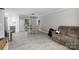 Open living space with a dining area, kitchen, and a comfortable couch, perfect for modern living at 232 Harmony Hills Dr, Catawba, SC 29704