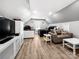 Bright bedroom with sloped ceilings, neutral tones, and a cozy seating area at 234 Rivercliff Dr, Stony Point, NC 28678