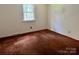 Empty bedroom featuring carpet and a view to the exterior through a window at 237 Antietam Rd, Statesville, NC 28625