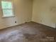 Bedroom with a window, neutral walls and carpeted floor at 237 Antietam Rd, Statesville, NC 28625