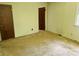 Bedroom with neutral walls and carpet, and two doors offering flexible layout options at 237 Antietam Rd, Statesville, NC 28625