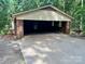 Brick two-car carport with a concrete slab driveway at 237 Antietam Rd, Statesville, NC 28625
