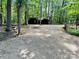 Long gravel driveway leading to a large metal building at 237 Antietam Rd, Statesville, NC 28625