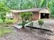 Side exterior view of home showing vinyl siding and brick with two-car carport at 237 Antietam Rd, Statesville, NC 28625