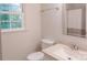 Clean bathroom with a granite countertop vanity, toilet, and a shower with a curtain at 3008 Heathcroft Ct, Charlotte, NC 28269