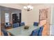 Open dining room with modern decor adjacent to the kitchen at 3008 Heathcroft Ct, Charlotte, NC 28269