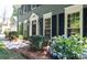 Close-up of a home's front entrance showcasing a manicured landscape and inviting entryway at 3008 Heathcroft Ct, Charlotte, NC 28269