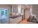 Bright kitchen with granite counters, subway tile backsplash, and stainless appliances at 3008 Heathcroft Ct, Charlotte, NC 28269