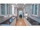 Modern kitchen featuring white cabinets, black countertops, and stainless steel appliances at 3008 Heathcroft Ct, Charlotte, NC 28269