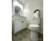 Bathroom featuring white cabinet and grey floor at 307 W Sunset Dr, Moore, NC 28110