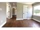 Bedroom with wood-look flooring and a window providing natural light at 307 W Sunset Dr, Moore, NC 28110