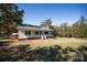 View of a single-story home featuring a front porch, chimney, and a spacious well-maintained yard at 3330 Clinzo Feemster Rd, Hickory Grove, SC 29717