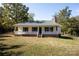 Charming single-story home featuring a inviting front porch and well-maintained yard, perfect for southern living at 3330 Clinzo Feemster Rd, Hickory Grove, SC 29717