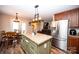 Kitchen featuring stainless steel appliances, center island and adjacent dining area at 3330 Clinzo Feemster Rd, Hickory Grove, SC 29717