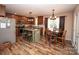 Well-equipped kitchen featuring an island, countertops, stainless steel appliances, and a cozy dining area at 3330 Clinzo Feemster Rd, Hickory Grove, SC 29717
