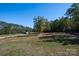 Expansive acreage featuring a mix of open fields and mature trees, perfect for outdoor activities at 3330 Clinzo Feemster Rd, Hickory Grove, SC 29717