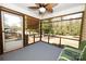 Screened porch overlooking the yard is a great space to relax at 3330 Clinzo Feemster Rd, Hickory Grove, SC 29717