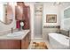 Stylish bathroom with a soaking tub, separate shower, and wood cabinets at 345 Beaten Path Rd, Mooresville, NC 28117