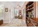 Sitting room features a cozy chair, built-in bookshelves, and sunny windows at 345 Beaten Path Rd, Mooresville, NC 28117