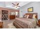 Inviting bedroom showcases a plush bed, warm brown tones, and bright natural light at 345 Beaten Path Rd, Mooresville, NC 28117