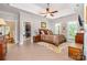 Main bedroom with trey ceiling, walk-in closet, and windows providing plenty of natural light at 345 Beaten Path Rd, Mooresville, NC 28117