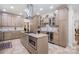 Gourmet kitchen with stainless appliances, granite counters, and large center island at 345 Beaten Path Rd, Mooresville, NC 28117