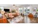 Inviting living room boasts a decorative rug, fireplace, neutral walls, and sun-filled windows at 345 Beaten Path Rd, Mooresville, NC 28117