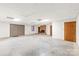Unfinished basement with brick fireplace, offering ample space for various uses at 3985 Well Rd, Mint Hill, NC 28227
