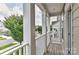 Inviting outdoor balcony showing neighborhood street and manicured landscaping at 402 Belton St, Charlotte, NC 28209