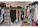 Walk-in closet with ample storage space, featuring shelving, rods, and drawers for organized storage solutions at 402 Belton St, Charlotte, NC 28209