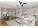Spacious living room and dining area with hardwood floors and modern decor providing great entertaining opportunities at 402 Belton St, Charlotte, NC 28209