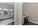 Cozy office space with natural light from multiple windows and simple, modern decor at 402 Belton St, Charlotte, NC 28209