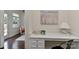 Bright office with white cabinets and a view of the living room at 402 Belton St, Charlotte, NC 28209