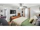Bedroom with hard wood floors, ceiling fan, and natural light from the window at 407 Rosemont Ave, Kannapolis, NC 28081
