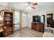Living room with light walls, hardwood floors, ceiling fan, and tv at 407 Rosemont Ave, Kannapolis, NC 28081