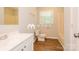 Well-lit bathroom featuring a single sink vanity and shower-tub combination at 4308 Pinto Ln, Gastonia, NC 28052