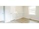 Bright bedroom with new flooring, a ceiling fan, and natural light at 4308 Pinto Ln, Gastonia, NC 28052