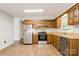 Beautiful kitchen with wood cabinets and stainless-steel appliances at 4308 Pinto Ln, Gastonia, NC 28052
