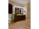 Bathroom featuring double vanity sinks with beautiful countertops and tile flooring at 6184 Chandler Rd, Clover, SC 29710