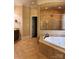 Luxurious bathroom featuring a soaking tub and separate tiled shower with glass door at 6184 Chandler Rd, Clover, SC 29710