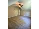Large bedroom with vaulted ceiling, neutral walls, carpet, and a ceiling fan. Great potential for personalization at 6184 Chandler Rd, Clover, SC 29710