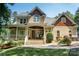 Charming two-story home with a welcoming porch and landscaped front yard offers great curb appeal at 6184 Chandler Rd, Clover, SC 29710