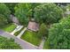 Aerial view featuring a well-maintained home with verdant surroundings at 6706 Farrington Ln, Charlotte, NC 28227