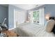 Bedroom featuring a window, closet and neutral decor at 6706 Farrington Ln, Charlotte, NC 28227