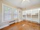 Comfortable bedroom with hardwood floors, built-in closet, and bright natural light at 729 Montgomery Ave, Albemarle, NC 28001