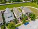 An aerial view shows a well-maintained neighborhood with lush green lawns and mature trees surrounding the homes at 827 Digby Rd, Rock Hill, SC 29730