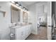 Bathroom with a double sink vanity, tiled floors, and entry to primary bedroom at 827 Digby Rd, Rock Hill, SC 29730